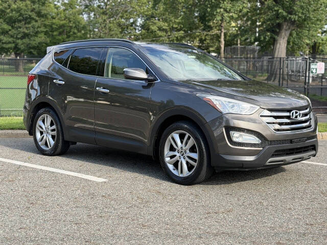 hyundai santa fe 2014 5XYZWDLA4EG216694 image hyundai santa fe 2014 5XYZWDLA4EG216694 image